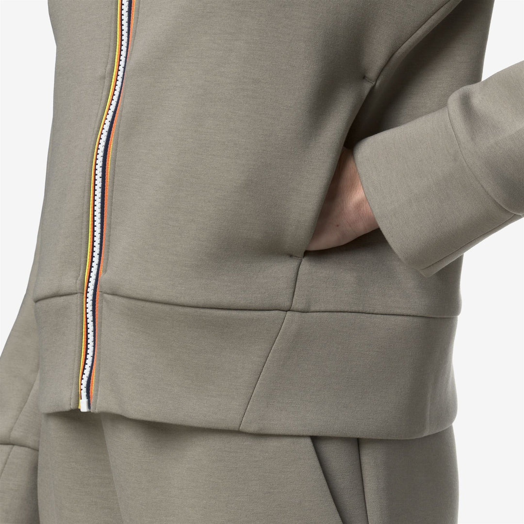 Giacca sportiva corta in pile verde da donna con cappuccio main