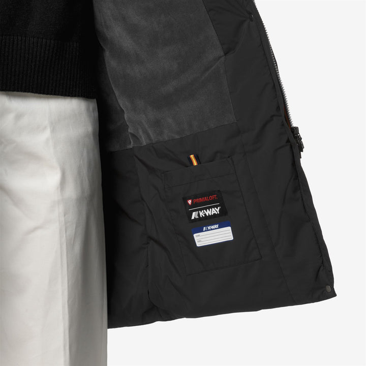 Chaqueta impermeable larga negra para mujer con forro de piel sintética 3