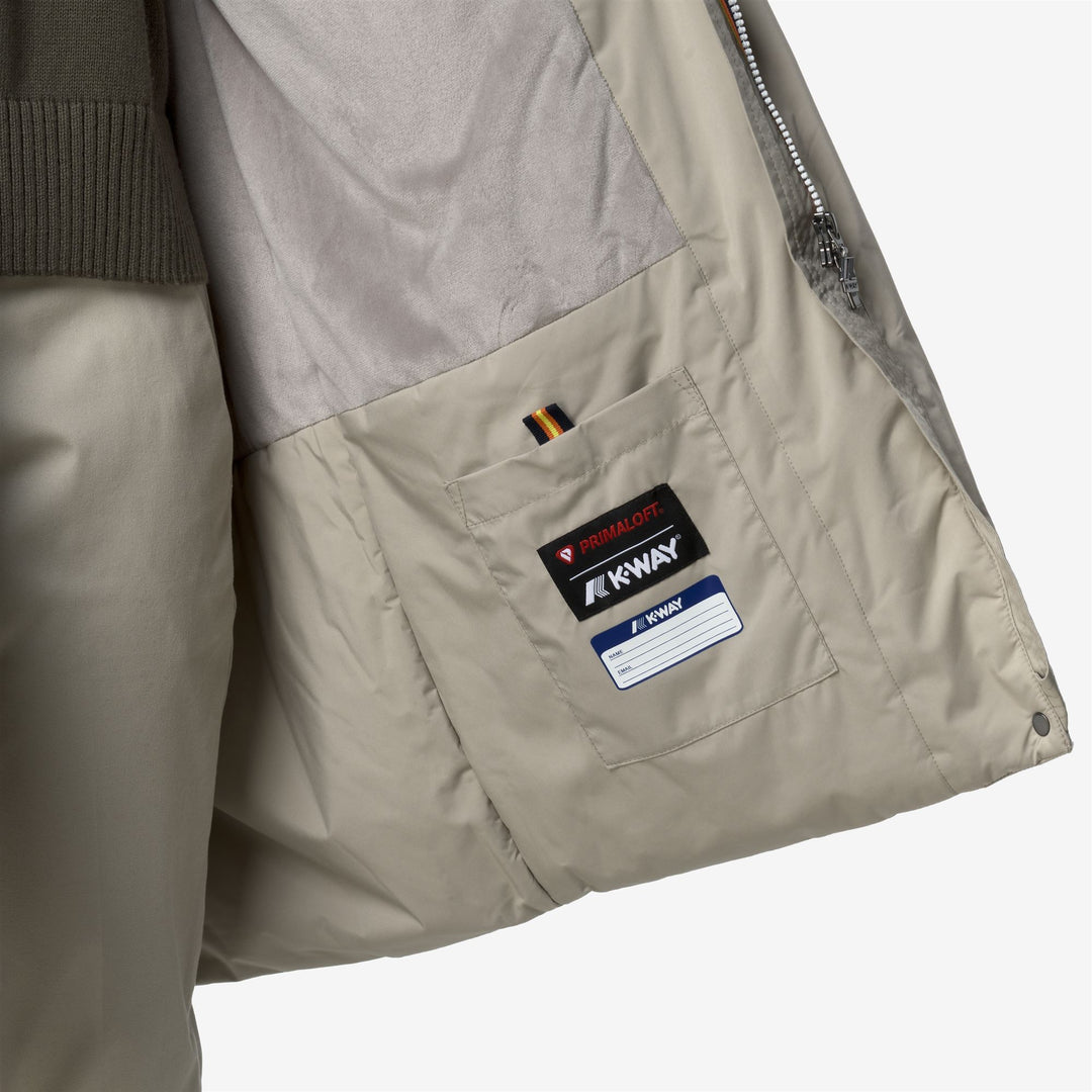 Chaqueta impermeable larga beige para mujer con forro de piel sintética main