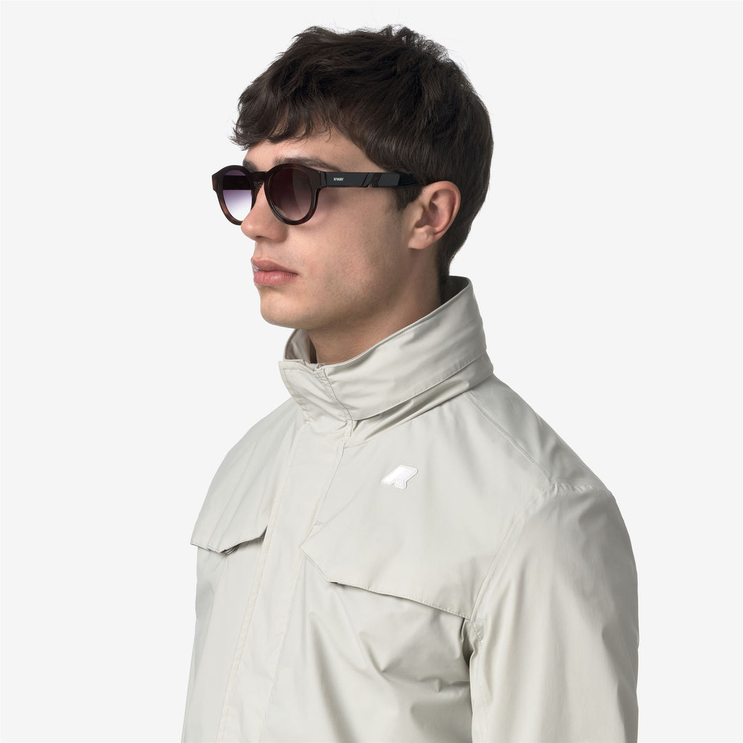 Gafas de sol unisex redondas marrones con patillas llamativas main