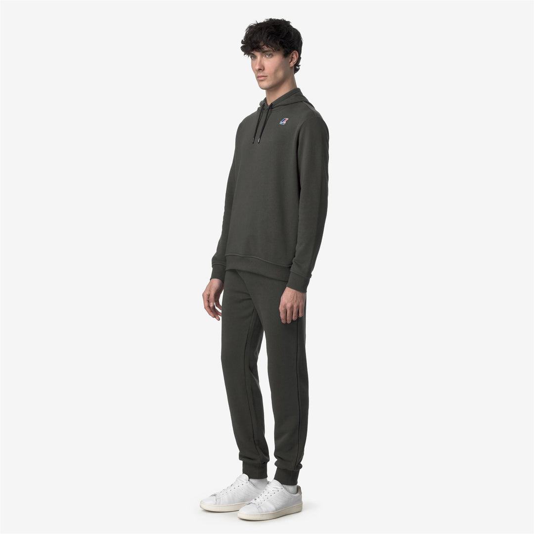 Pantalones deportivos unisex verde oscuro para correr en la ciudad main