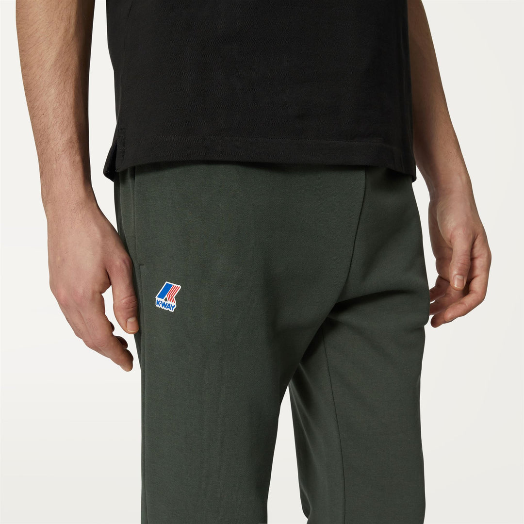 Pantalones deportivos unisex verde oscuro para correr en la ciudad main