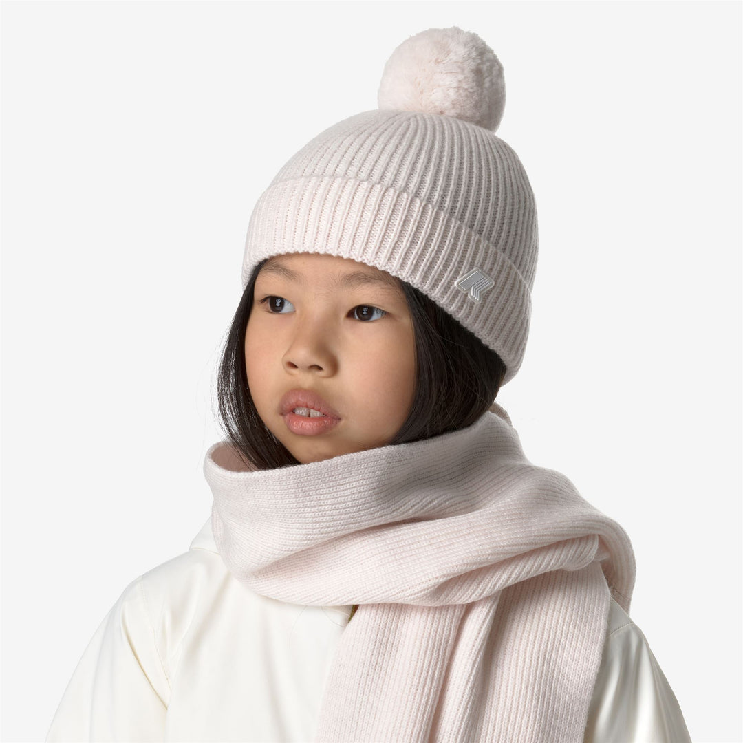 Gorro de lana gris y blanco para niña con pompones para invierno main