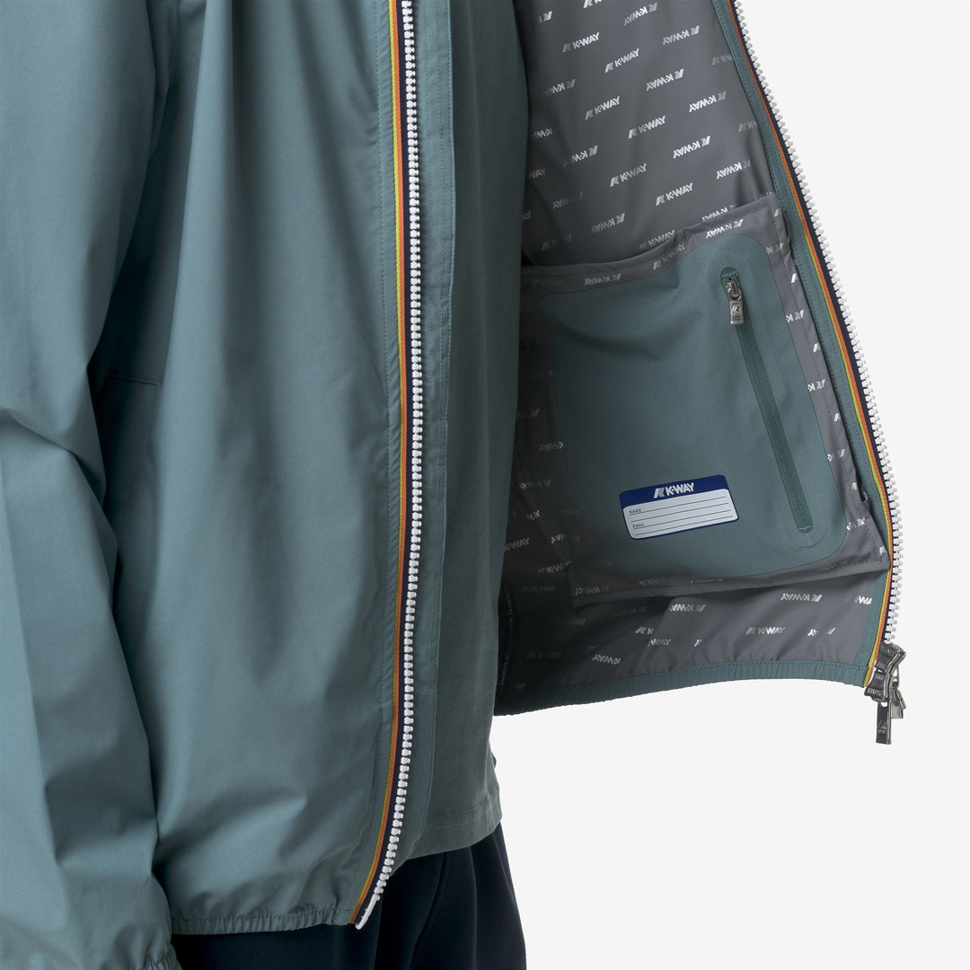 Chaqueta corta impermeable azul verde para hombre con tela elástica main