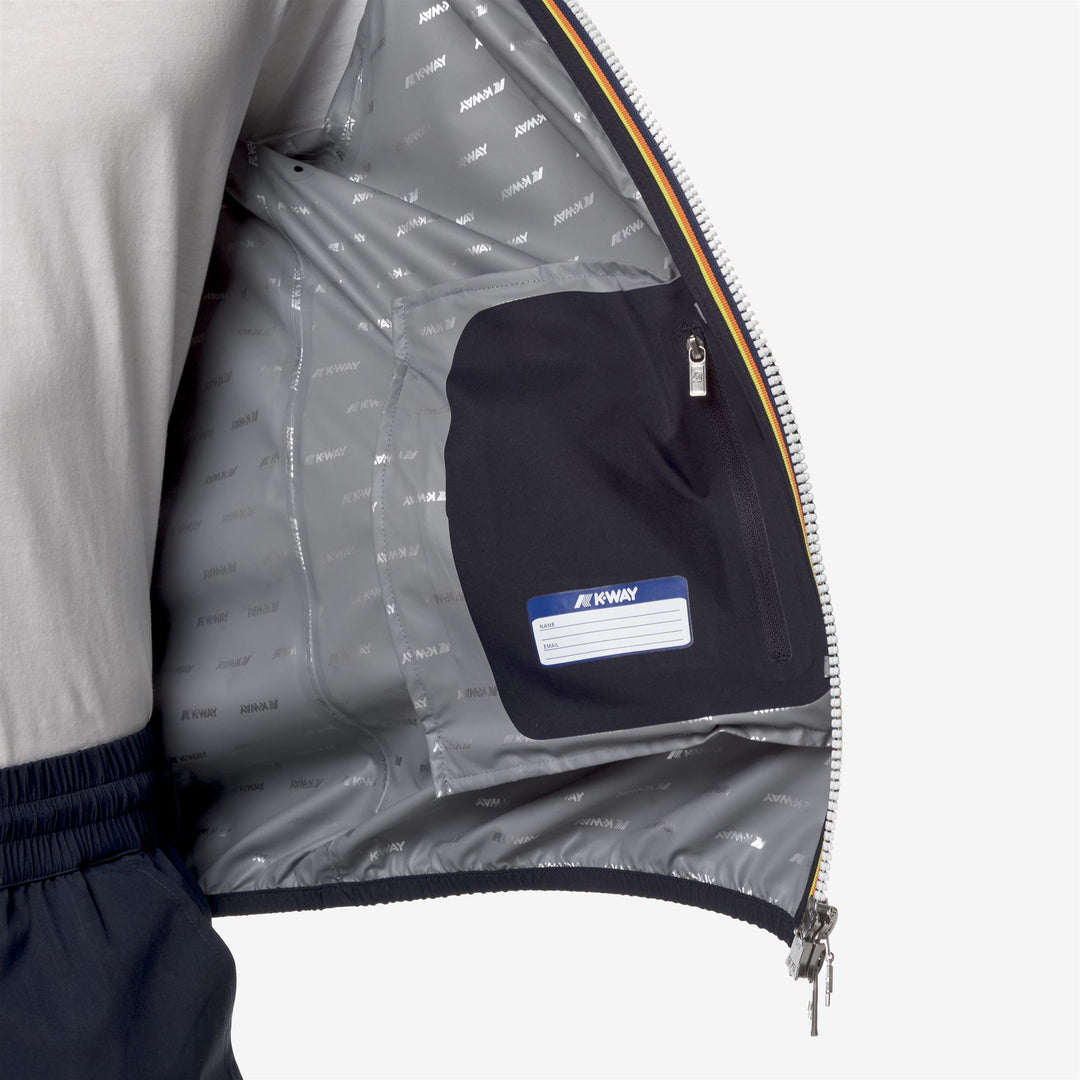 Chaqueta impermeable azul para hombre, corte slim para clima variable main