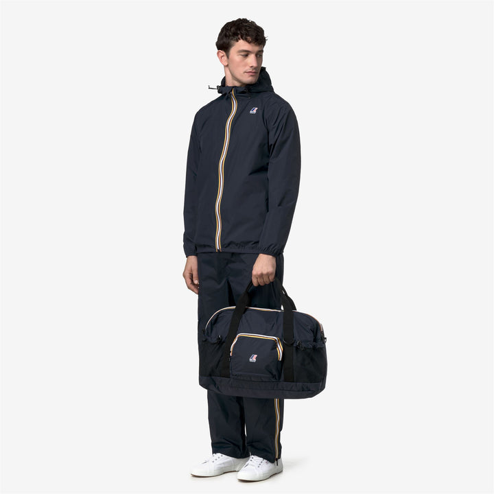 Borsone unisex blu ripiegabile con cerniera e tasche 6