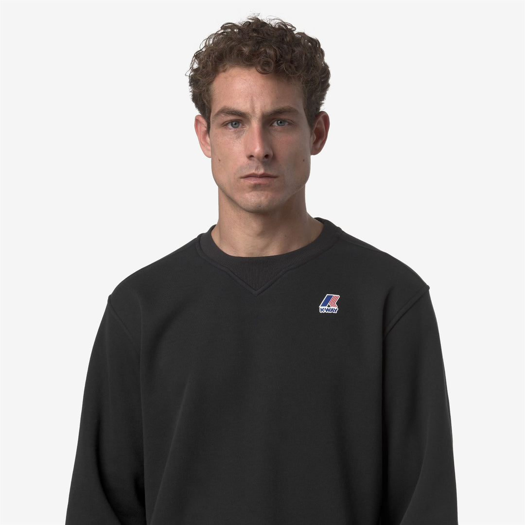 Suéter unisex de cuello redondo de polar cepillado negro para actividades al aire libre main