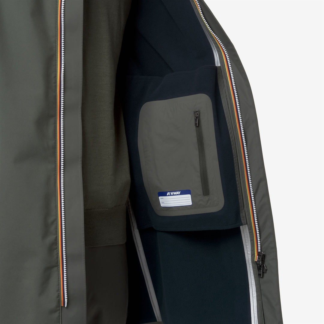 Chaqueta impermeable larga verde y negra para hombre main