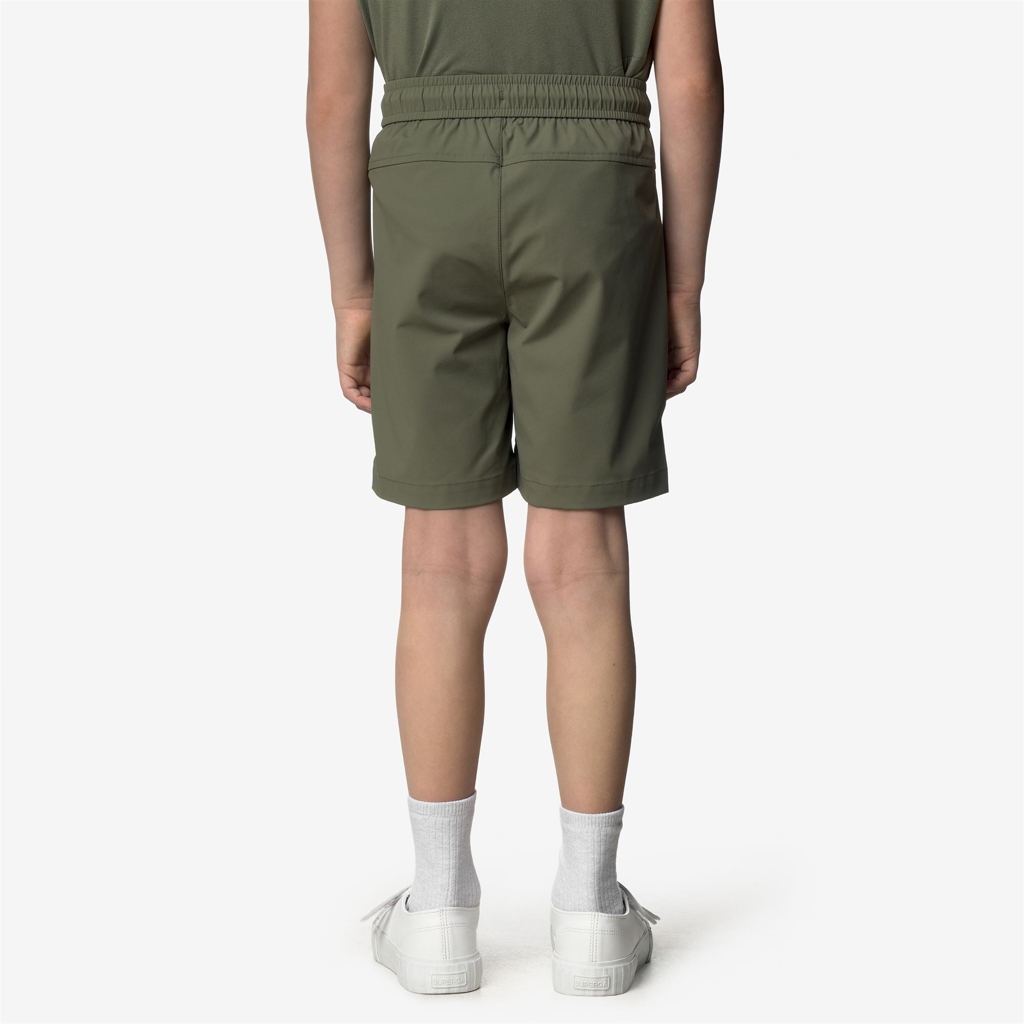 Shorts_Kid unisex_P. NESILIER TRAVEL_Sport Shorts_Green Lichen - Commercial 6