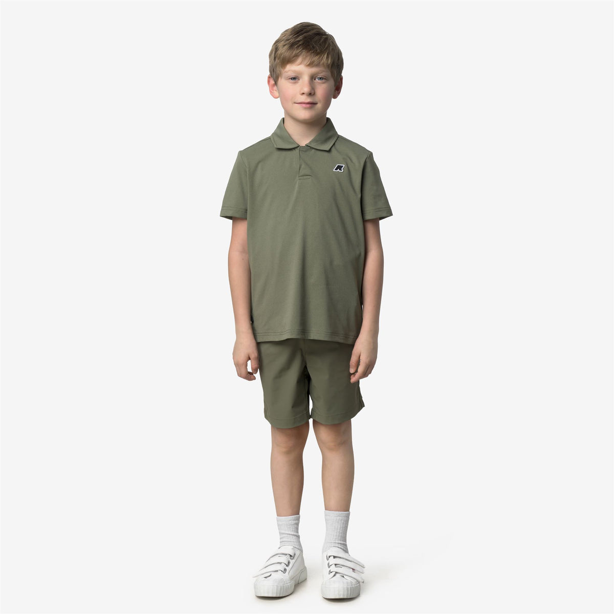 Shorts_Kid unisex_P. NESILIER TRAVEL_Sport Shorts_Green Lichen - Commercial 4