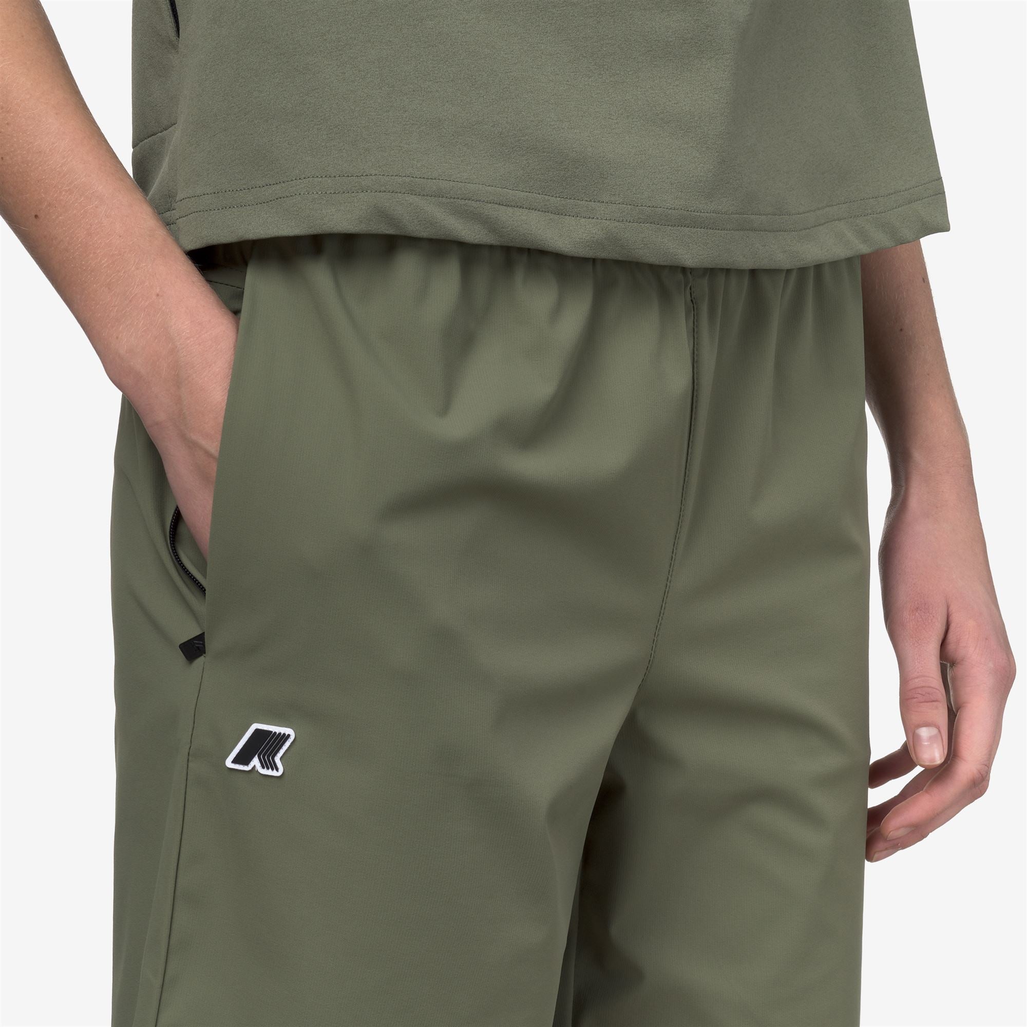 Shorts_Unisex_NESILIER TRAVEL_Sport Shorts_Green Lichen - Commercial 7