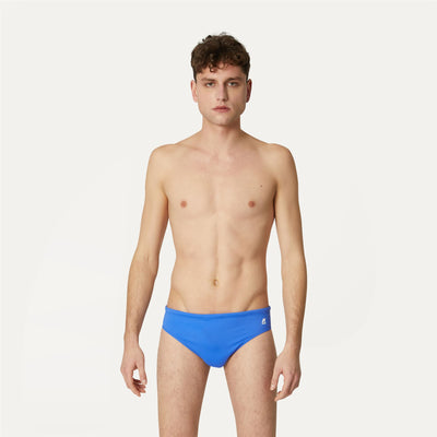 Bathing Suits Man Omer Olympic Brief BLUE ULTRAMARINE Dressed Back (jpg Rgb)		