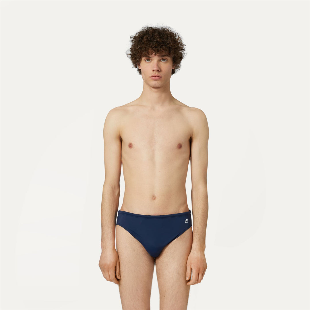 Bathing Suits Man Omer Olympic Brief BLUE DEPTH Dressed Back (jpg Rgb)		